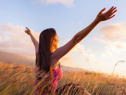 woman with outstretched arms