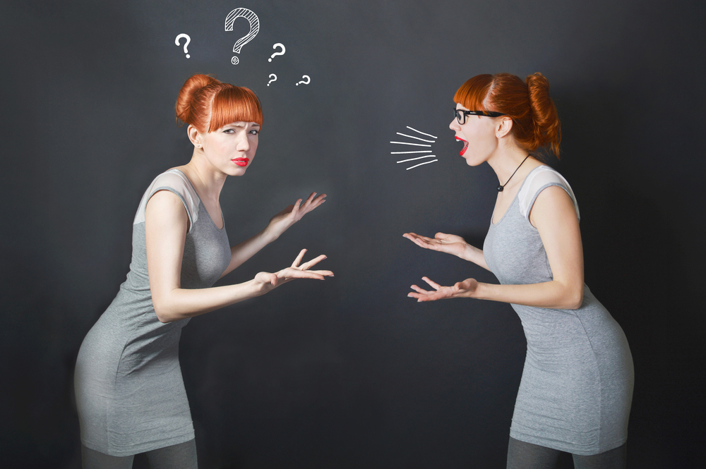 mirror image of a confused woman