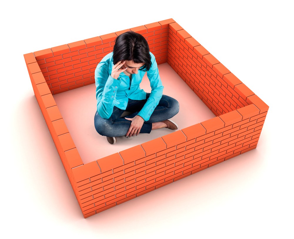 woman surrounded by orange wall