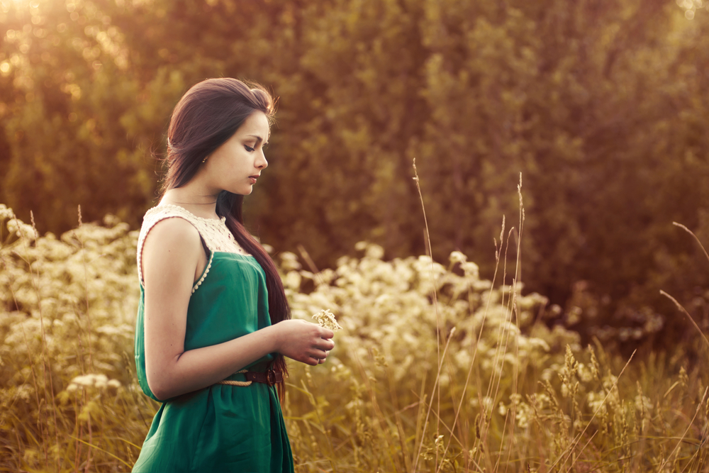 anxious, pensive looking woman