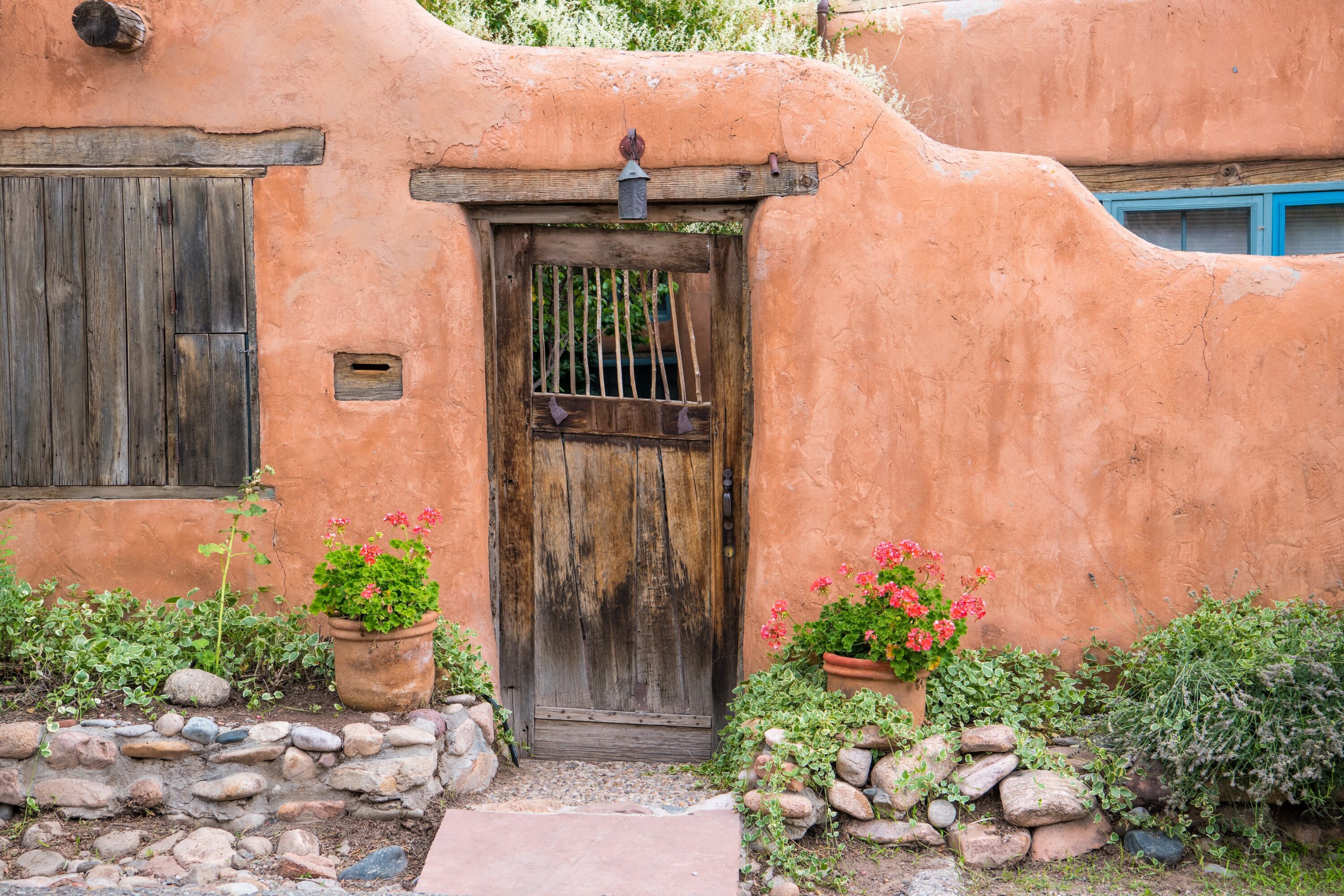 Wooden gate in an old adobe wall, Santa Fe, New Mexico